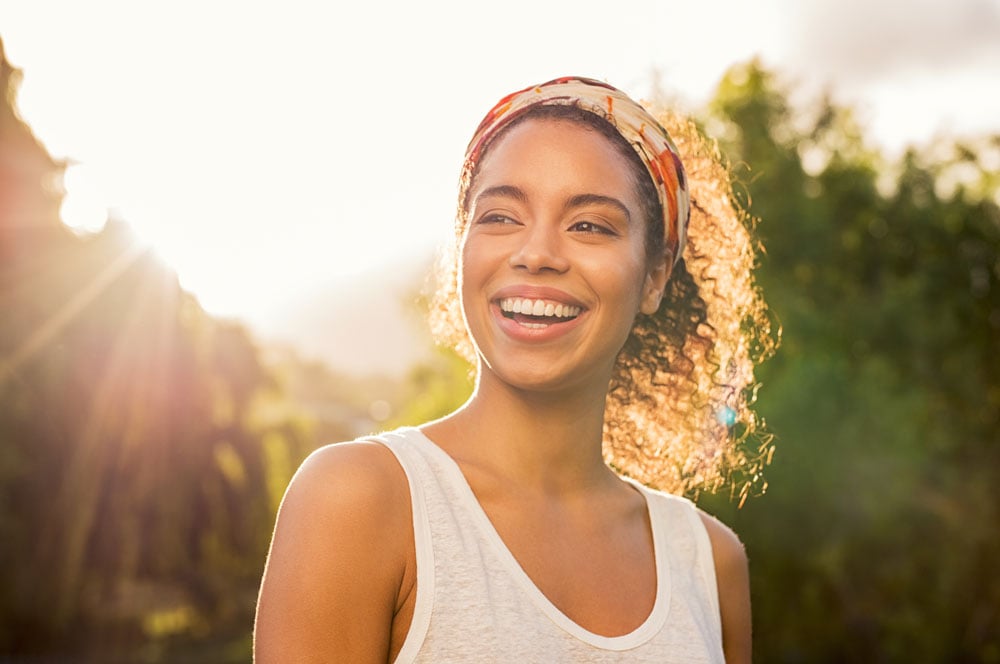 women-smiling-at-sunset