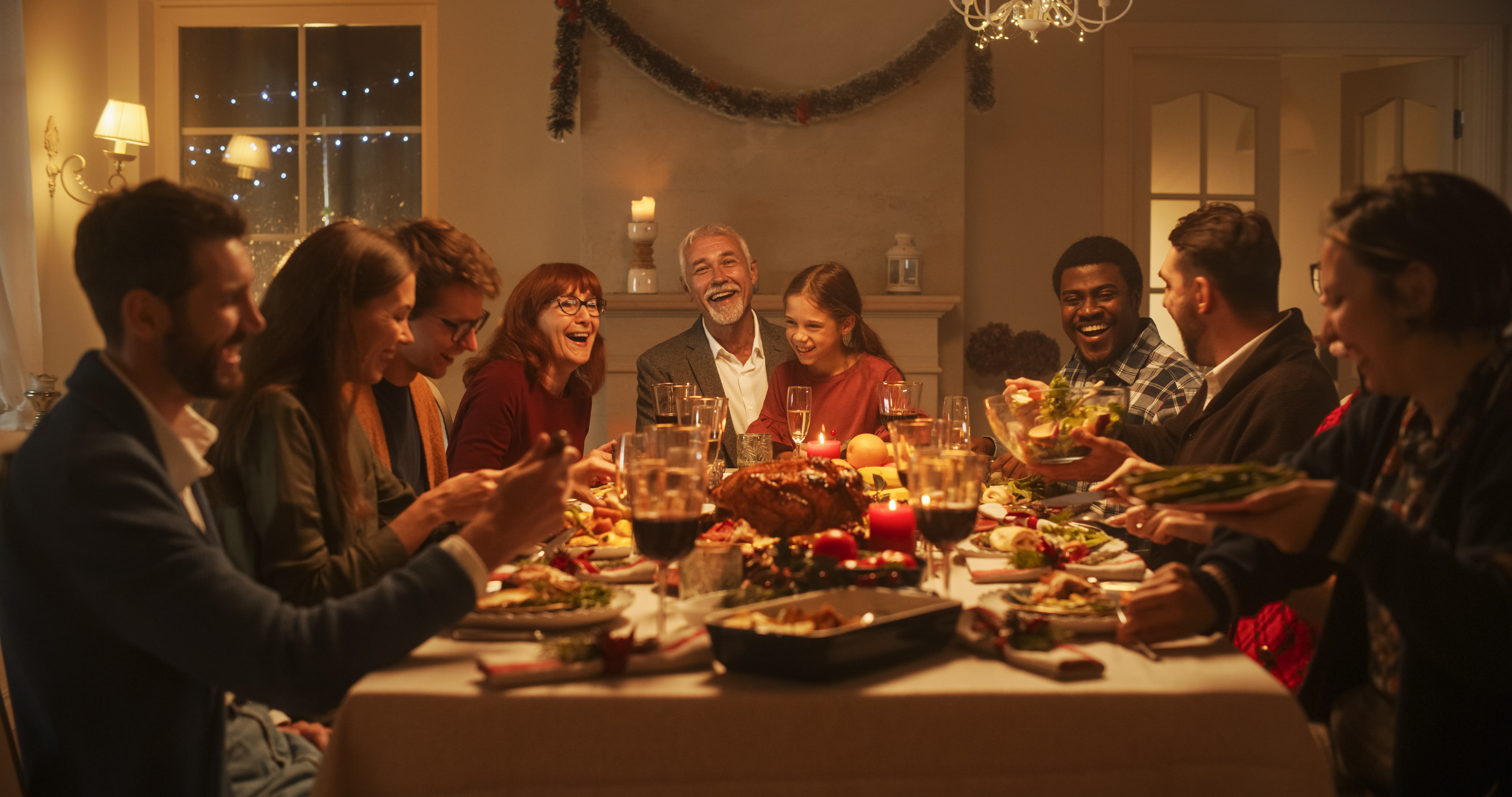 Holiday family gathering at the dinner table. 