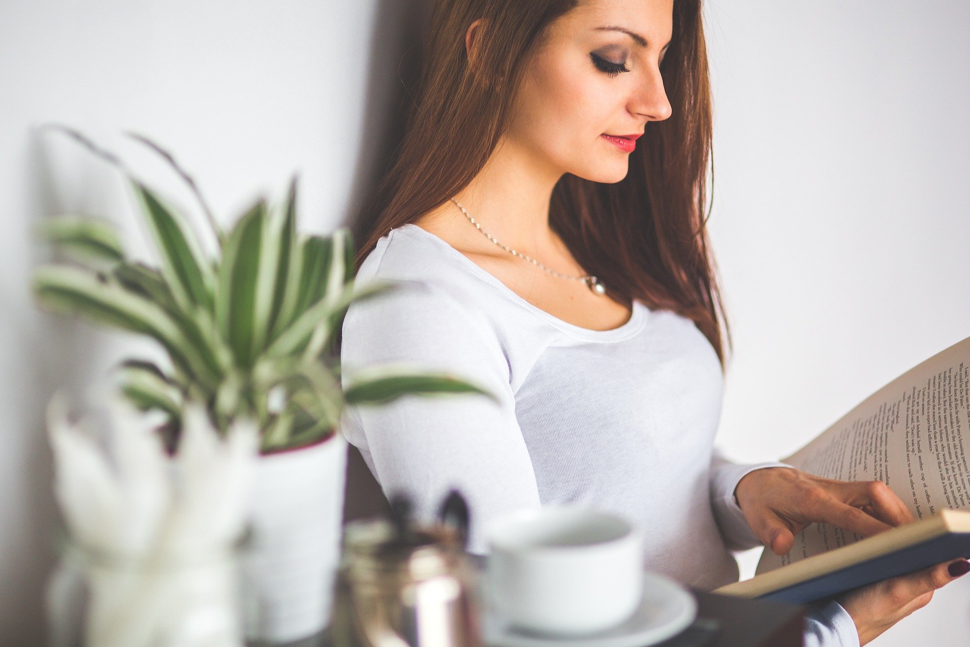 Woman reading a fertility book